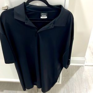 Two XL. Beautiful black Nike golf shirt, worn four times.